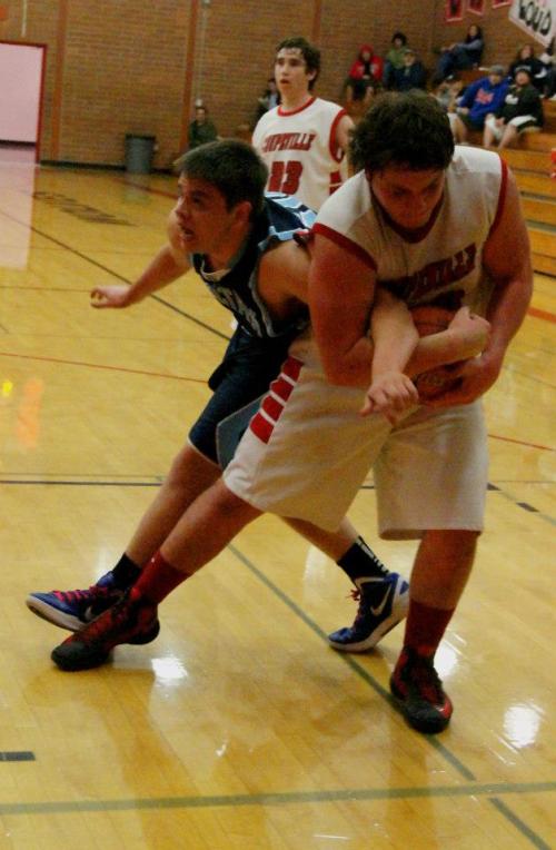 Nick " The Threshing Machine " Streubel tries to remove a Sultan's player's arm from its socket.