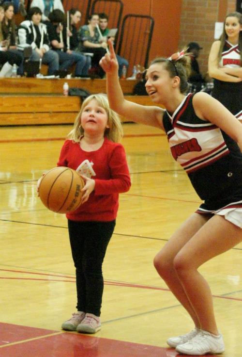 Get help shooting baskets from Wolf cheerleader Nicole Becker...