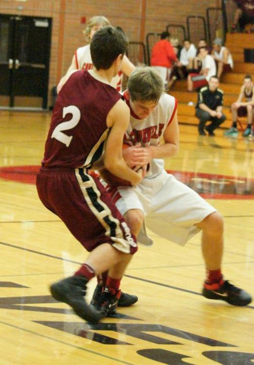 Aaron Curtin (right) battles hard for a ball.