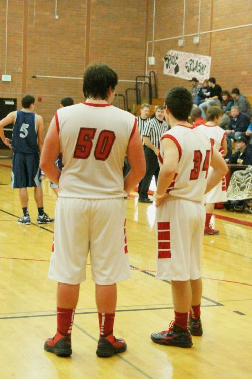 Ben Etzell (34) has a conversation with Nick Streubel (50). "So then I'm gonna bounce off the back wall and do a reverse 360 into the first row of the stands!!" (Shelli Trumbull photo)