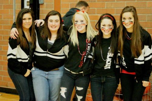 Wolf cheerleaders (l to r) Destiny Bitting, Elizabeth Bishop, Emily Clay, Emilee Crichton and Iris Ryckaert.
