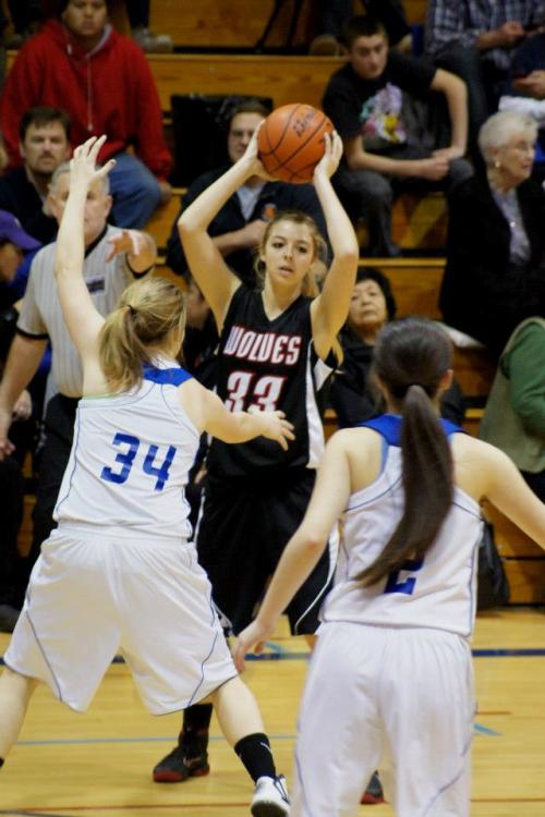 Katie Kiel looks for an open teammate as she triggers the play.