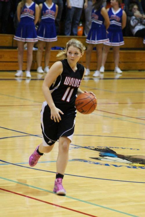Breeanna Messner's pink shoes are powerful, but four straight games on the road -- with one to go -- is a bit much for any team. (Shelli Trumbull photo)