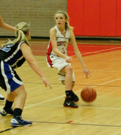 Kacie Kiel directs traffic for the Wolves. (Shelli Trumbull photos)