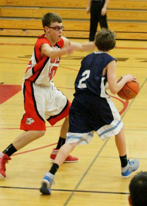 Jared Helmstadler brings the defensive heat for the Wolves. (Shelli Trumbull photos)