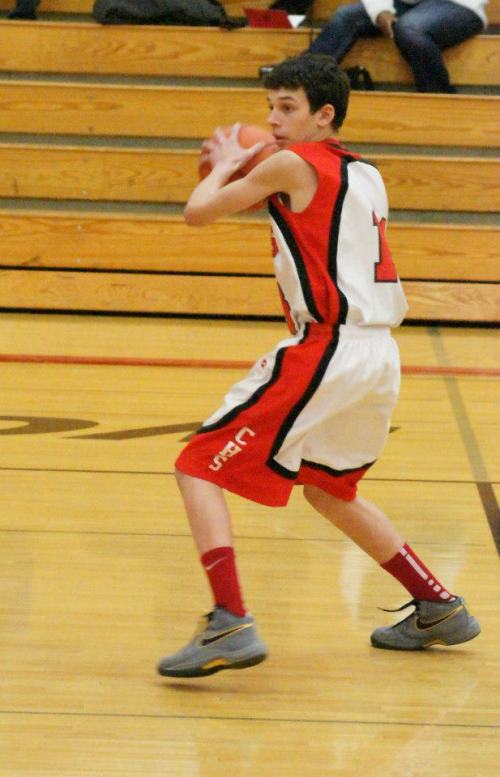 Schuyler Montgomery looks for an opening in the defense on his way to a season-high four points.
