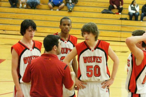 Coach V talks to his troops. Left to right are Ryan Griggs, Anthony Bergeron, Isaac Vargas and Wiley Hesselgrave.
