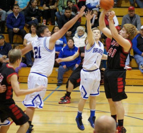 Valko takes a jumper under considerable pressure.