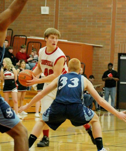 Caleb Valko did a bit of everything -- setting up plays, shutting down the league's top scorer and, later, running over a fat-ass ref with a bad attitude. (Shelli Trumbull photos).