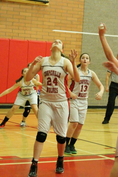 Monica Vidoni (24), backed up by the Bailey sisters in a game earlier this season, scored a season-high 16 Thursday. (Shelli Trumbull photo)