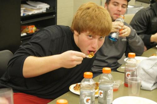 Drew Chan (right) has seen Caleb Valko eat before ... and gives him plenty of room.