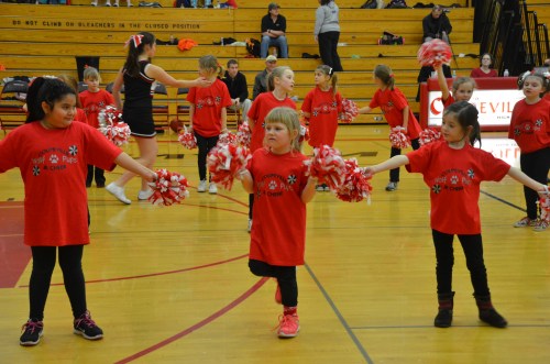 Elementary school cheerleaders perform a halftime routine Tuesday. (Robert Bishop photos)
