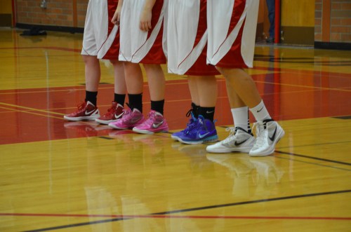 You can tell the Wolves apart by the color of their shoes.