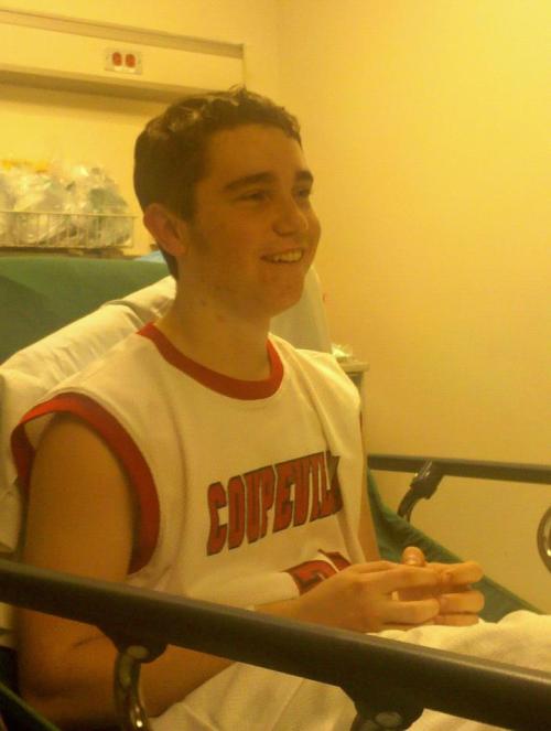 Still wearing his Wolf jersey, Aaron Trumbull had regained his smile an hour after suffering a horrifying fall during Friday night's boys' basketball game. (Shelli Trumbull photo)