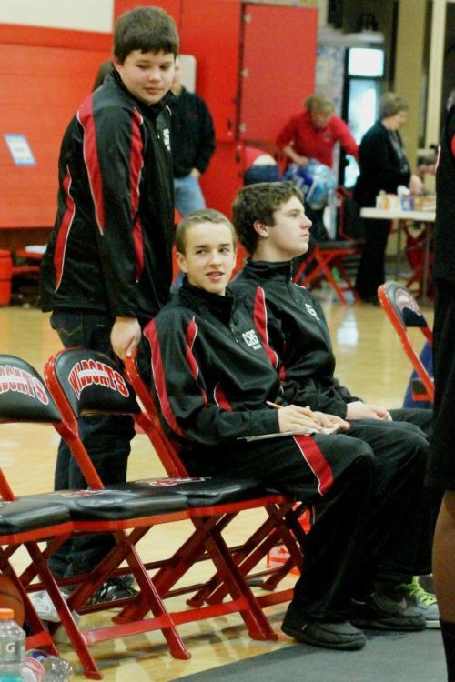 Did Joel Walstad (center) tell  CJ Roberts (left) and Wiley Hesselgrave (right) that he had a Superman jersey on under his warmups? (Shelli Trumbull photo)