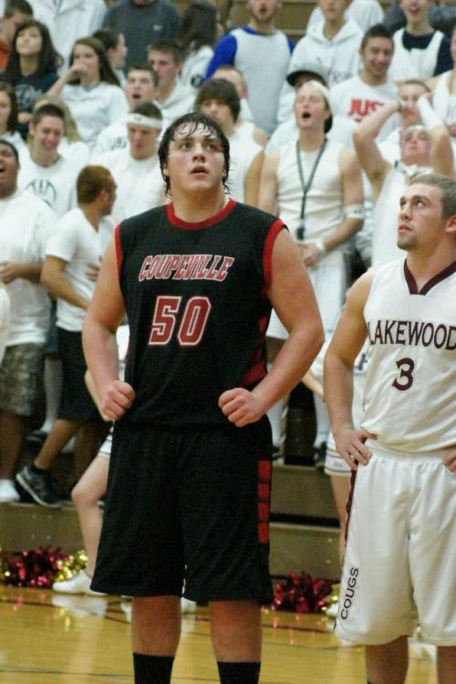 Streubel watches the free-throw, while his opponent is caught gazing at Streubel's hair. "HOW does he get it so silky?!?!"