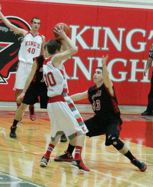 Aaron Trumbull drops down and plays picture-perfect defense Tuesday night. (Shelli Trumbull photos)