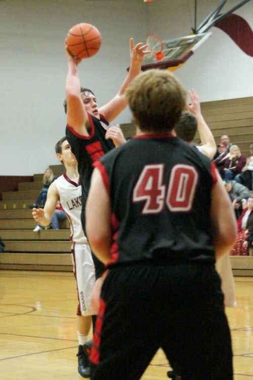Fun with optical illusions, as Nick Streubel looks like he's about to throw down a dunk.