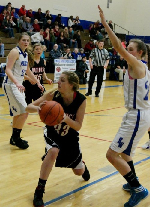 Katie Kiel snags a rebound.