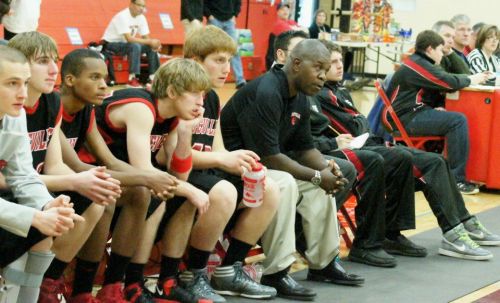 The Wolf bench has a variety of reactions to action on the court Wednesday night. (Shelli Trumbull photo)