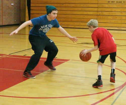 Aaron Trumbull (left) prepares to drop the boom on a young pupil.
