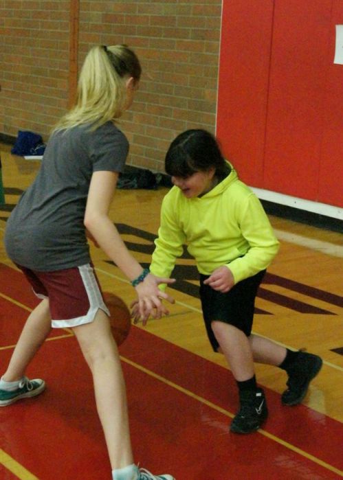 Mollie Bailey, younger sister of Wolf stars McKayla and McKenzie, breaks down her foe with a nasty cross-over dribble.