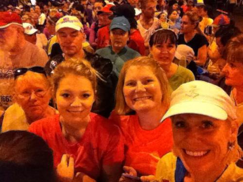 Meanwhile, dad Robert Bishop (in white hat) looks slightly less enthused...