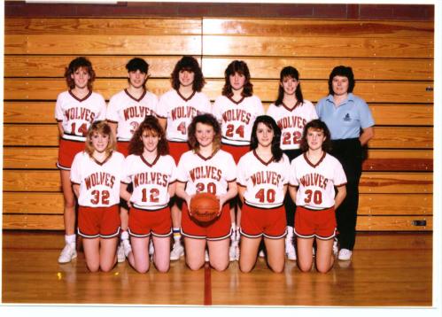 CHS basketball in '87. Back row, l to r, are Tina Barker, Sarah Powell, Terri Perkins, Marlene Grasser, Carol Estes, Coach Phyllis Textor. Front row: Aimee Messner, Trudy Eaton, Cheryl Pangburn, Sally Biskovich and Sherry Bonacci.
