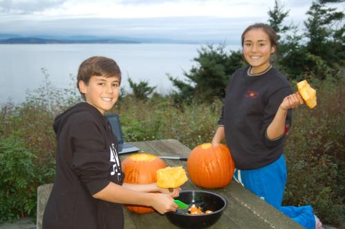 The future and the past of Wolf soccer, freshman Dawson d'Almeida and sister Amanda, enjoy Halloween, back when it was still balmy outside.