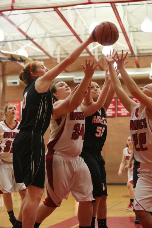 Hailey Hammer (34) fights for a rebound.