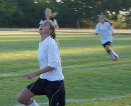 Micky LeVine, seen here tracking a ball during her high school season, may be relatively small, but she packs a punch. (Shelli Trumbull photo)