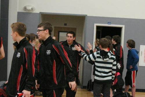 The conquering hero exits the locker room after the win.