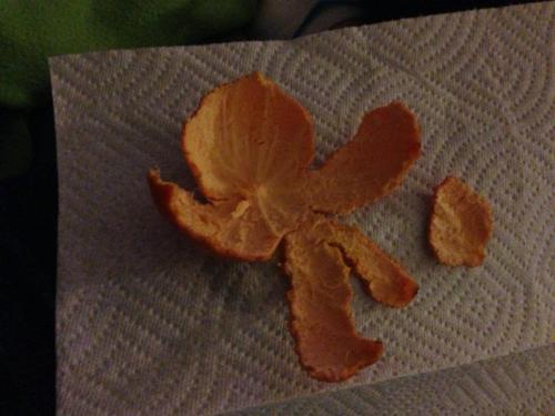 Orange peel soccer player (with ball), courtesy Kenzie Perry.