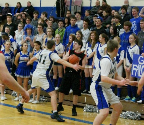 A packed crowd, with Wiley Hesselgrave besieged by Falcon faithful...