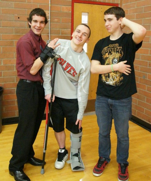 The stylishly dressed injured reserve -- l to r, Ben Etzell, Gavin O'Keefe and Aaron Trumbull.