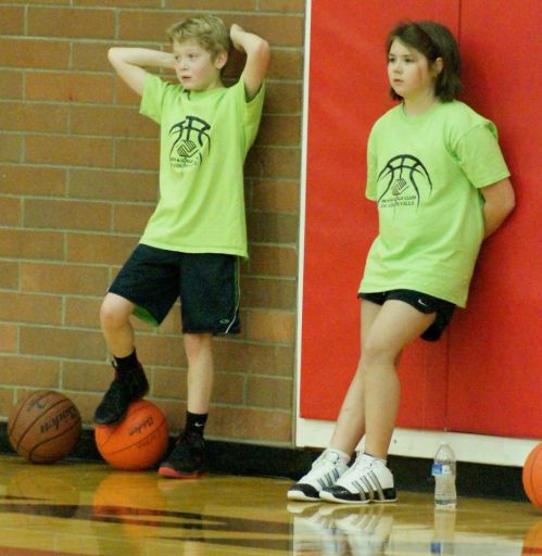 My former video store "assistant manager" (left) surveys the court he's about to wreck.