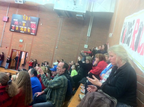 Jon Crimmins turns his camera phone on the tons of parents using THEIR camera phones to record Friday night's youth cheerleader performance. (Jon Crimmins photo)