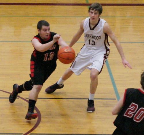 Drew Chan drives hard to the hoop. (Shelli Trumbull photos)