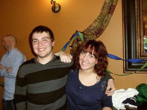 Away from the court and the smile comes back out, as he hangs out with big sis Laura.