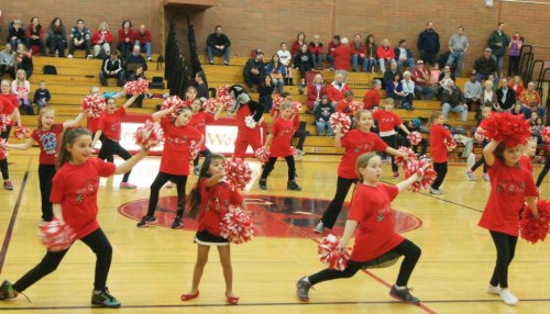The junior cheerleaders perform at halftime of the boys' basketball game Friday. (Shelli Trumbull photos).