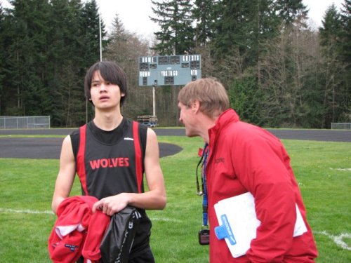 Edwards listens to some advice from Wolf coach Randy King.