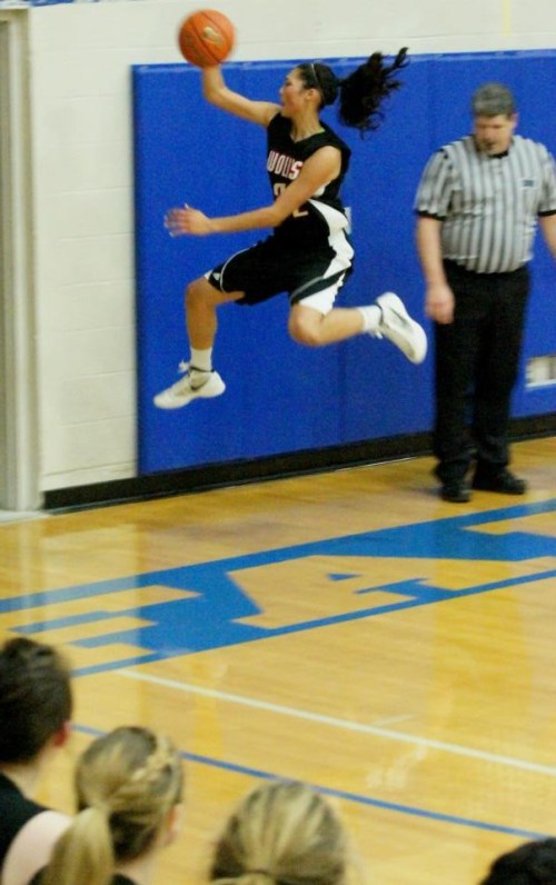 Makana Stone goes airborne in pursuit of a loose ball. (Shelli Trumbull photos)