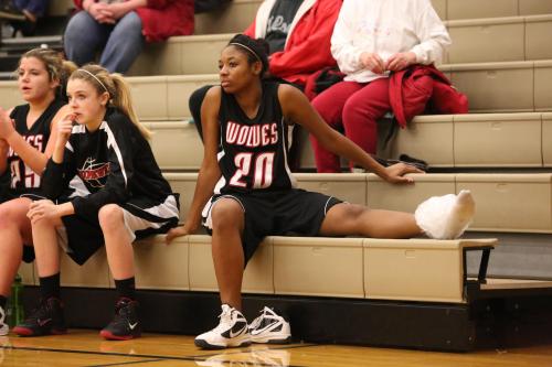 Jai'Lysa Hoskins ices down her hurt ankle.