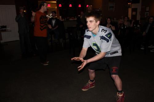 Gunnar Langvold taking the snap, Xbox style, at the Christopher's staff party. (Kelsy Simmons photo)