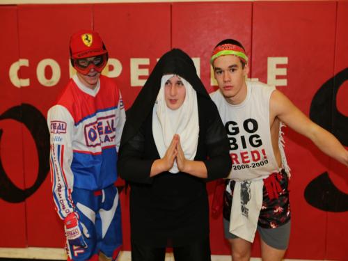 Josh Bayne, Kyle Bodamer and Jake Tumblin (l to r) play dress-up. (John Fisken photo)