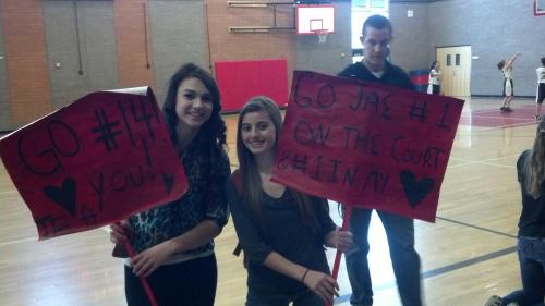 Ashley Miller (left) and Micky LeVine cheer for younger sisters Mattea Miller and Jae LeVine Wednesday. (Amy Briscoe photo)