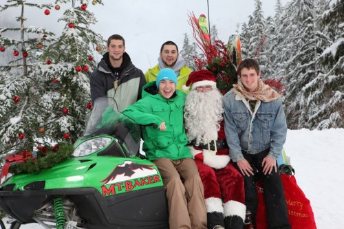Landau (far right) and friends share a moment with Santa. In back, Luke Pelant )left) and Danny Savalza. Up front, Ben Wehrman.
