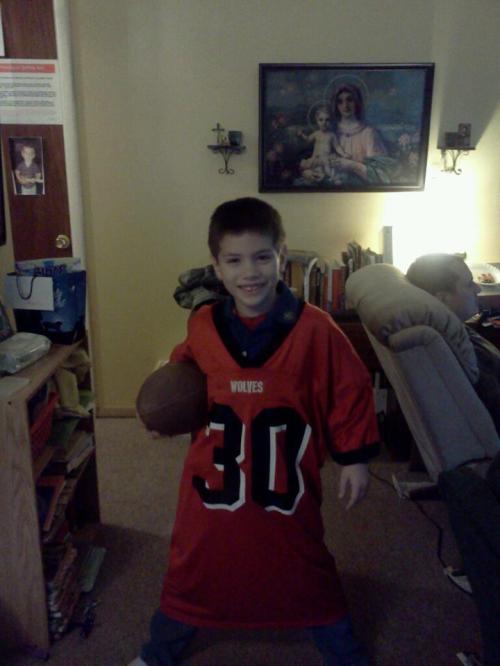 The football legacy of Mike Smart lives on through his smiling son. (Kim Robinette photo)