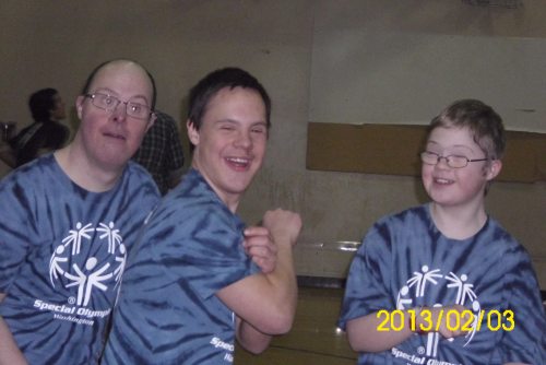 Lucas Etzell (center) and teammates.