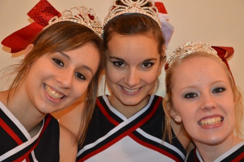 Senior cheerleaders (l to r) Nicole Becker, Iris Ryckaert and Emily Clay. (Robert Bishop photo)